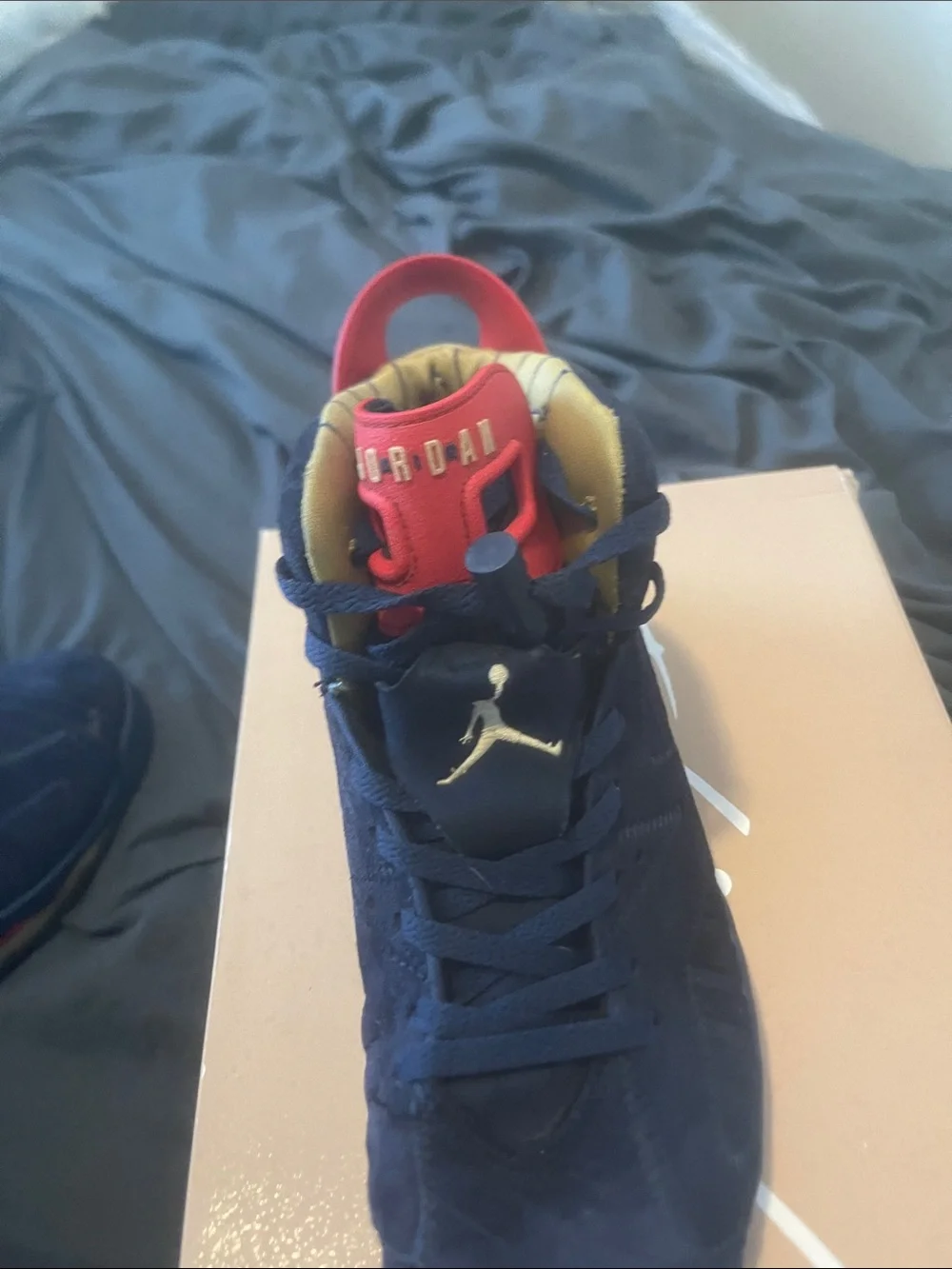 Jordan Men’s Athletic Shoes Navy Blue with Red and Gold Accents